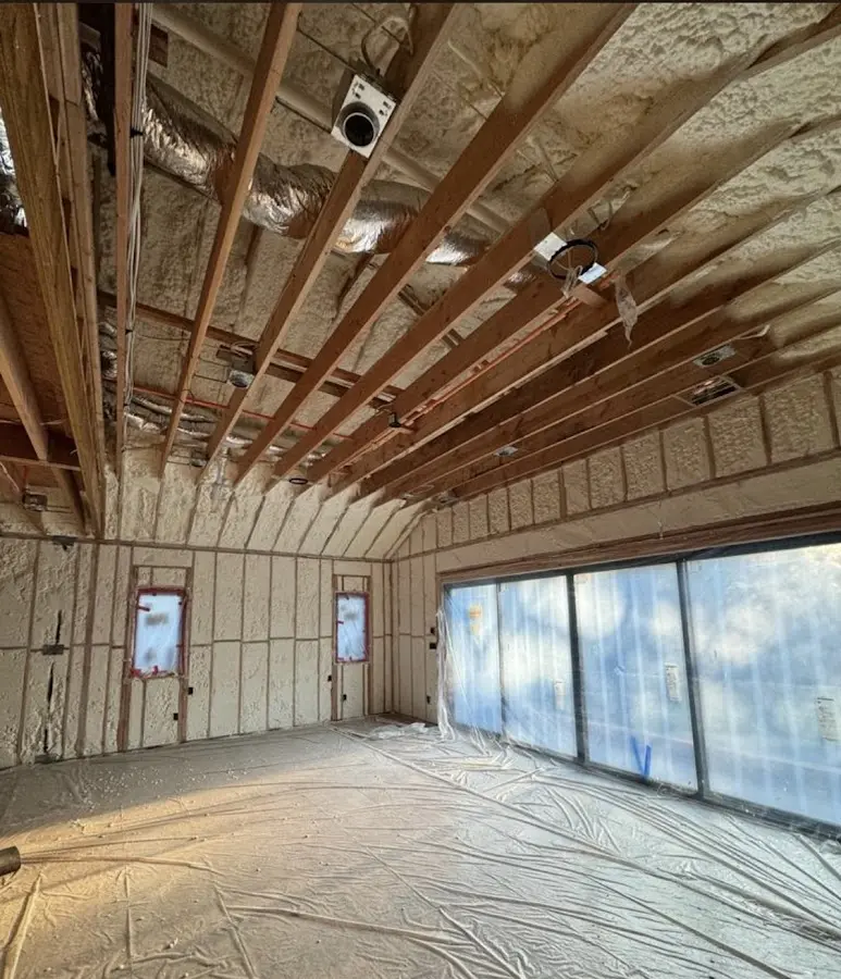 Interior walls and ceiling insulated with spray foam during new construction in Offutt AFB